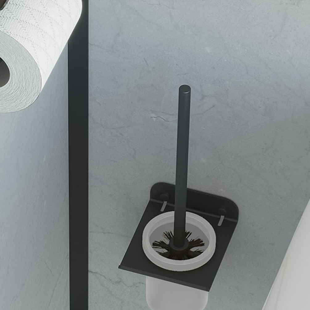Lifestyle image of Origins Living Sonia Quick WC Brush Set Black mounted on marble white wall.