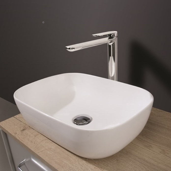 Lifestyle image of Crosswater Real Counter Basin on wooden surface with chrome tall tap