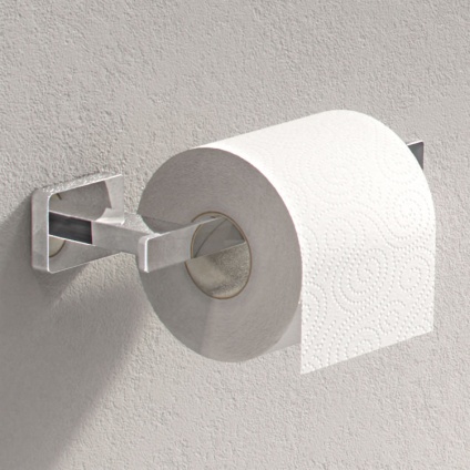 Lifestyle image of the Origins Living Gedy Atena Open Toilet Roll Holder with toilet roll attached, mounted against an off-white textured wall.