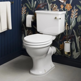 image of a burlington close coupled toilet and seat in a floral patterned indigo bathroom