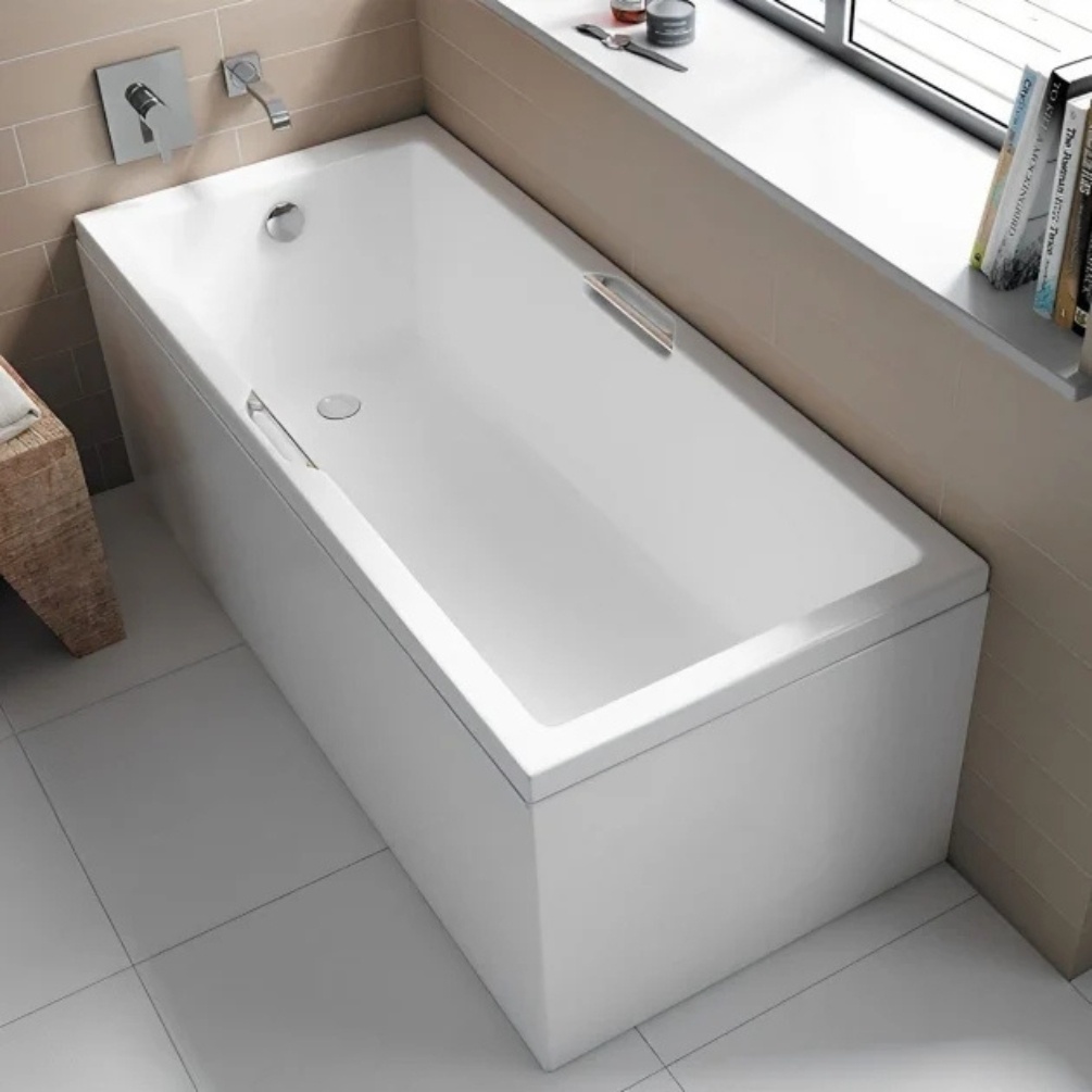 Lifestyle image of the Carron Quantum Integra 1600mm x 700mm Single Ended Bath with Twin Grips installed in the corner of a bathroom