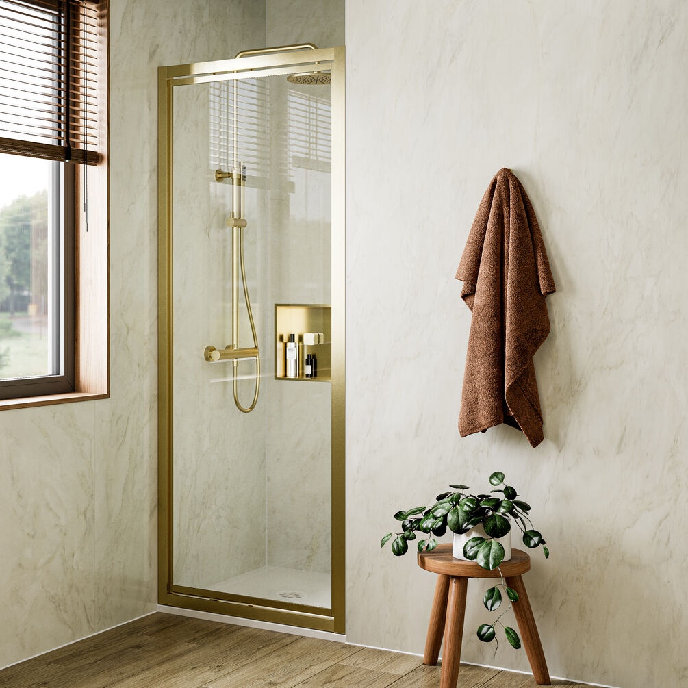 Lifestyle image of Crosswater Clear 6 Brushed Brass 1000mm Infold Shower Door