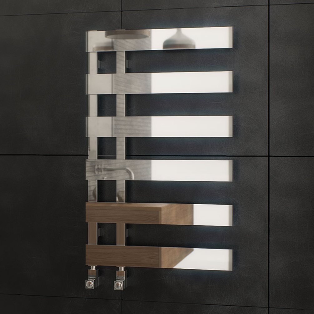Lifestyle image of the Radox Dora 810mm x 500mm Chrome Heated Towel Rail mounted on a black bathroom wall