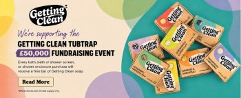 getting clean soap banner advertising free bar of soap on purchases with colourful background and pile of soap on right
