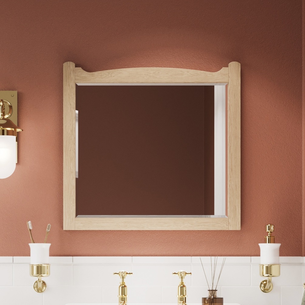 Product lifestyle image close up of Burlington Guild 600mm x 570mm Light Oak Bathroom Mirror against orange wall GU6057LOK