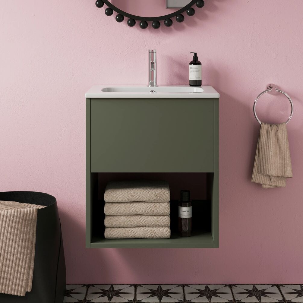 Front facing lifestyle image of the Britton Hackney Earthy Green 500mm Wall Hung Vanity Unit & Basin with towels